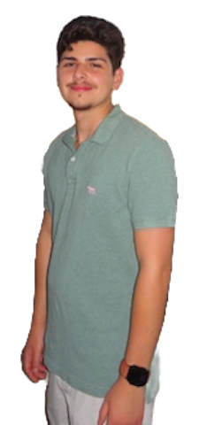 Nicholas Huertas, a student in his early twenties with dark hair, smiling while travelling abroad